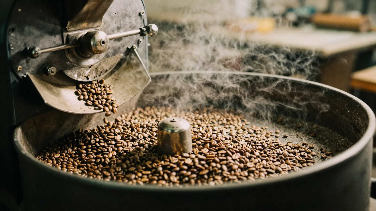 Freshly roasted beans spilling into the cooling tray